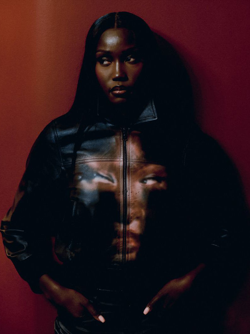 ADWOA campaign portrait wearing a printed leather jacket